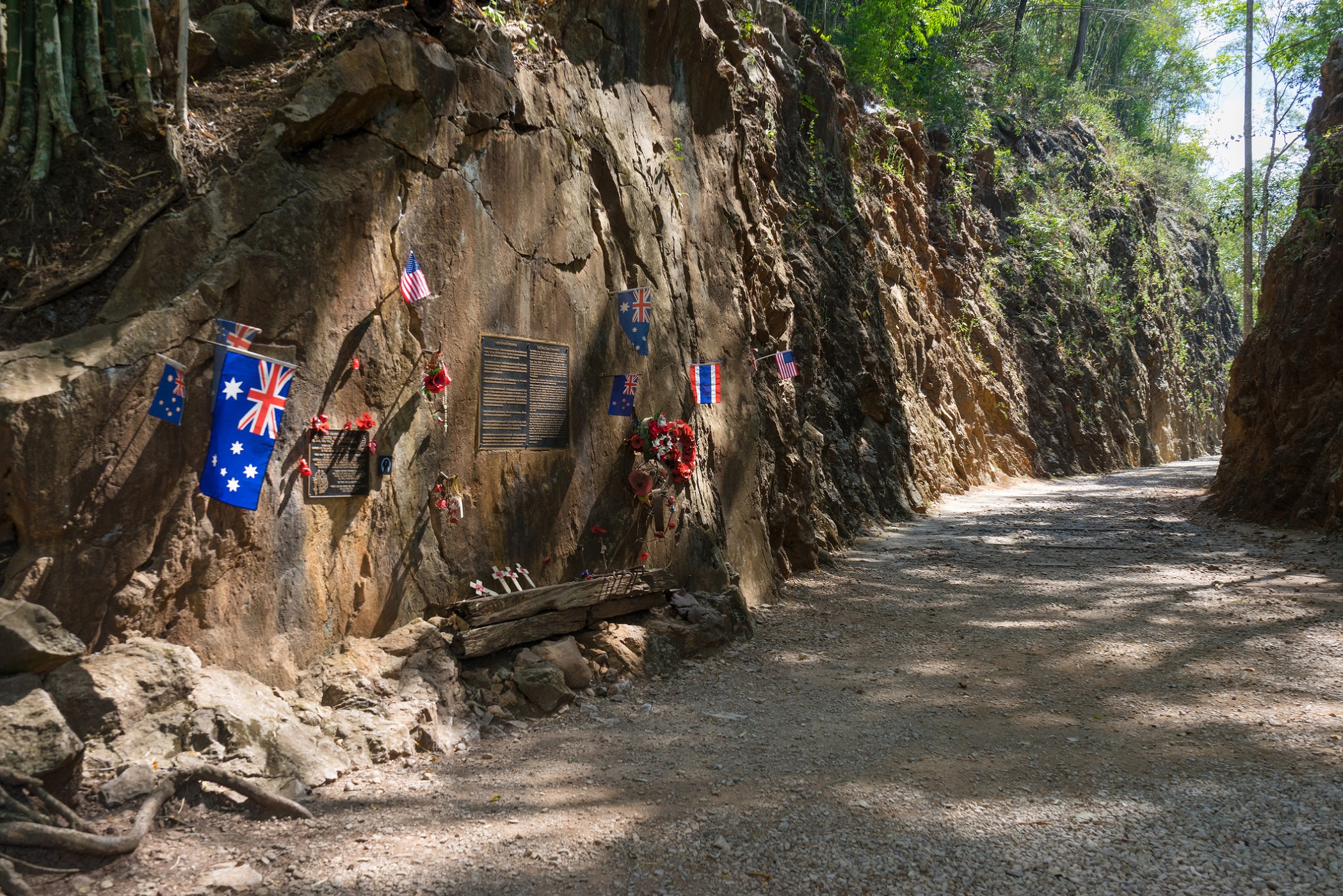 Flags and metal plates at Hell Fire Pass